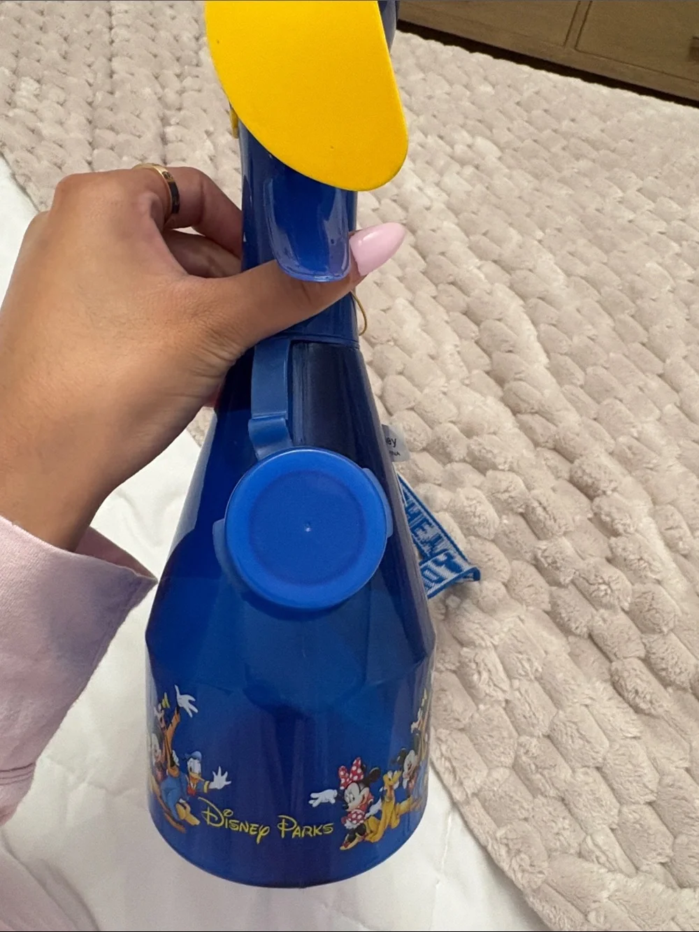 Discontinued Disney Blue Handheld Fan with Yellow Blades and Character Strap